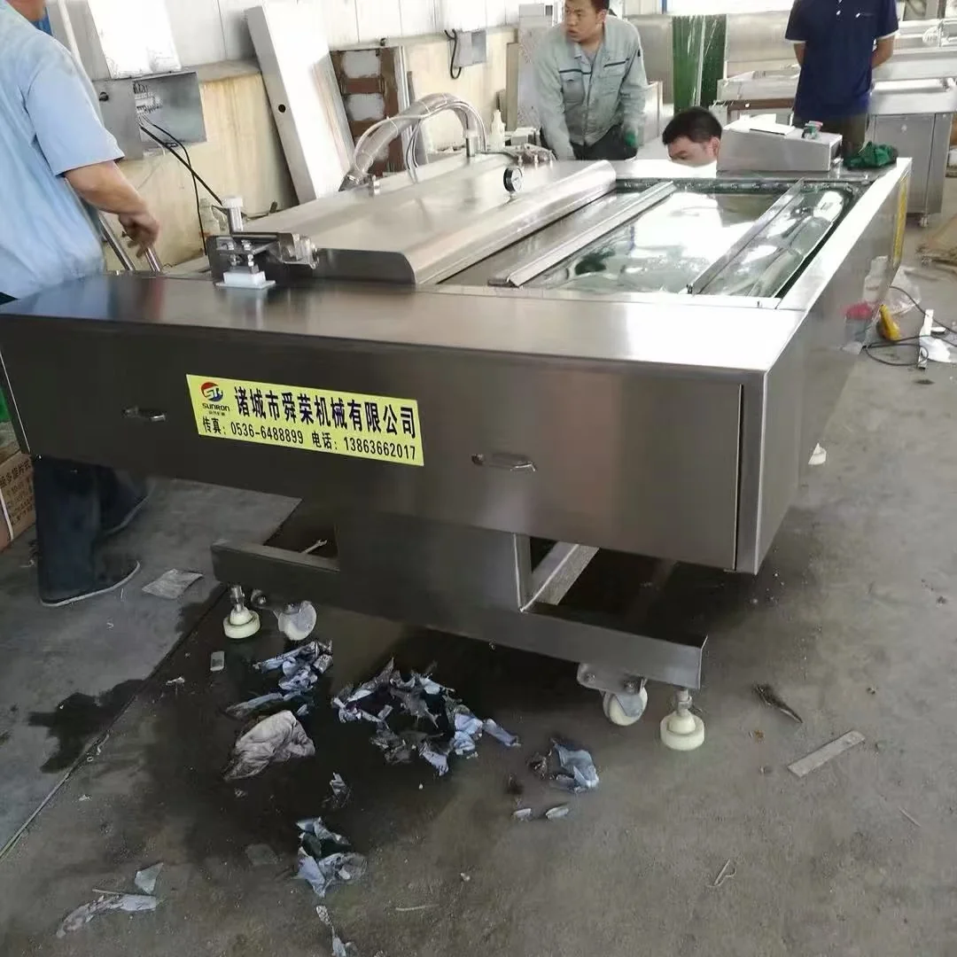 Double-chamber vacuum packing machine