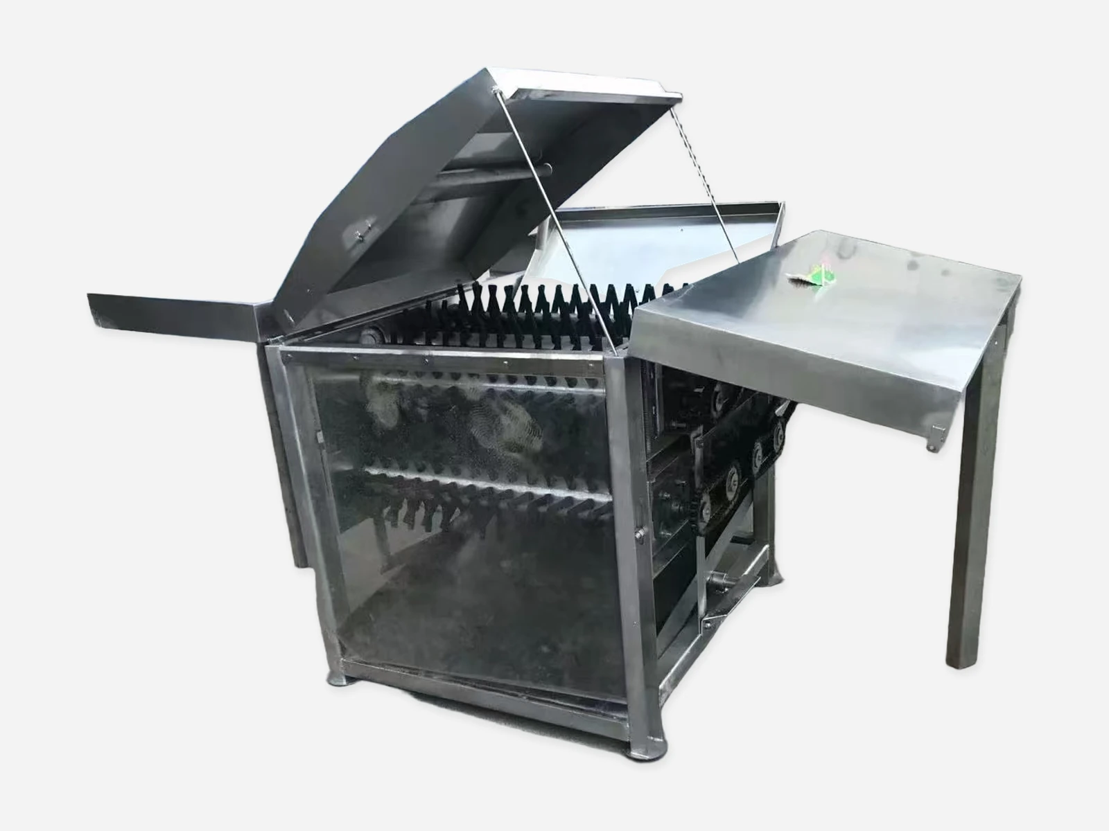 Horizontal poultry plucker