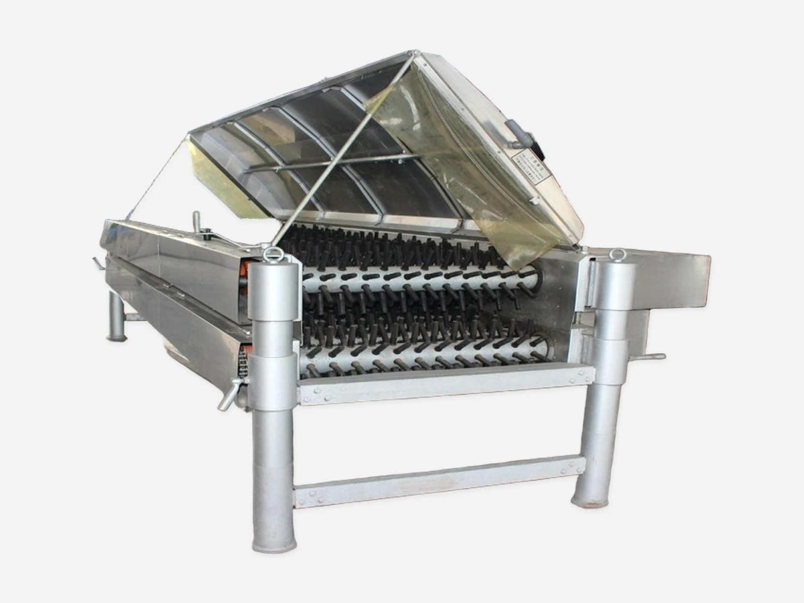 Horizontal poultry plucker